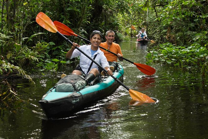 4 Day Tambopata Jungle Tour with Local Guide - Day 1: canopy tower, zip line, kayak, Monkey Island, then caimans at night