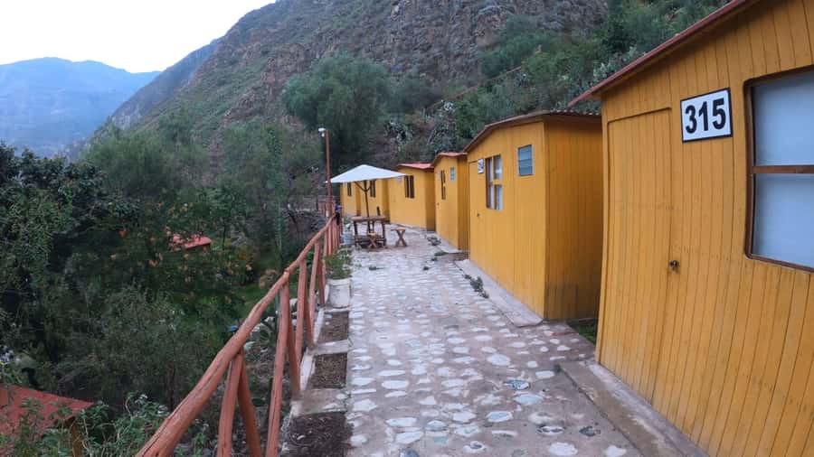 Arequipa: 2-day Colca Canyon Trekking, Ending in Puno - Descent day one: Pampas de San Miguel, the river rest, and the first suspension bridge