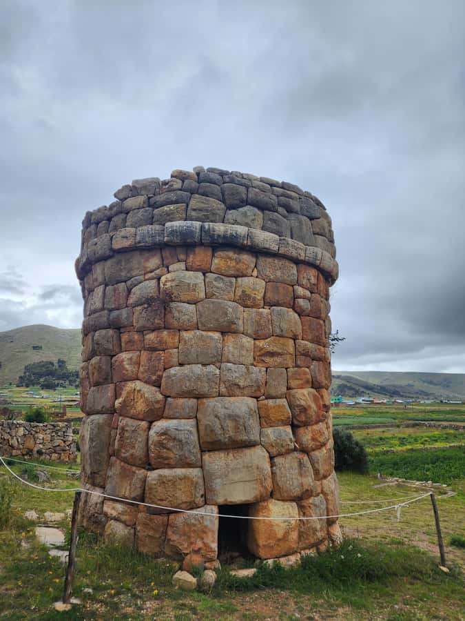 Aymara Route Mystical Cultural Tour - Chullpas de Molloco: square and circular towers with niche details