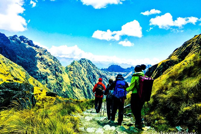 Classic Inca Trail 4 days to Machu Picchu - Freddy the guide, Armando the cook, and a porter team that does the heavy lifting