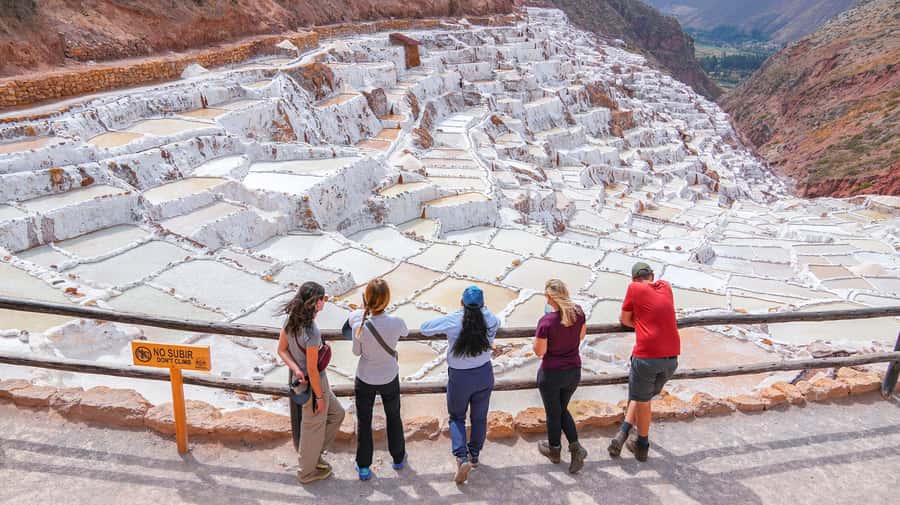 Cusco: 4-Day Lares Trek to Machu Picchu with Panoramic Train - Day 1: Cusco to Lares hot springs, Blue Lagoon camp, and textile culture