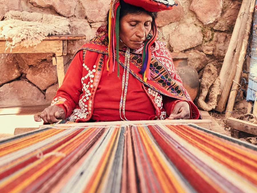 Cusco: Full-Day Sacred Valley History Tour - Ollantaytambo ruins by the river, with Wiracocha connections