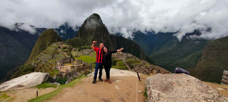 Cusco: Machu Picchu Day Trip with Train + Entrance ticket - Climbing into Machu Picchu: guided tour time and what you can expect