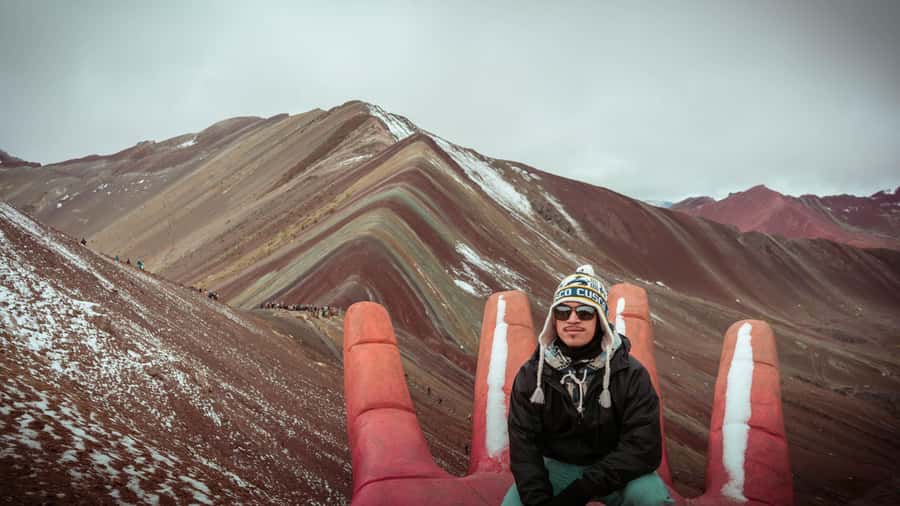Cusco: Rainbow Mountain Tour and Red Valley Hike (Optional) - Summit time: photos, info from the guide, then a breather