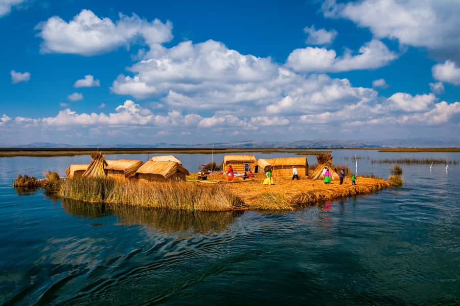 From Cusco: Titicaca Lake - Full day tour with sleeper bus - Uros Floating Islands by speedboat: totora reeds and a very specific kind of tourism