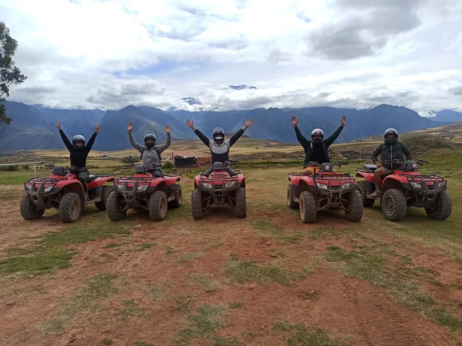 From Cuzco: Salt Mines and Moray Ruins ATV Adventure - Salt Mines: spring-fed water, rectangular pools, and dusty trails