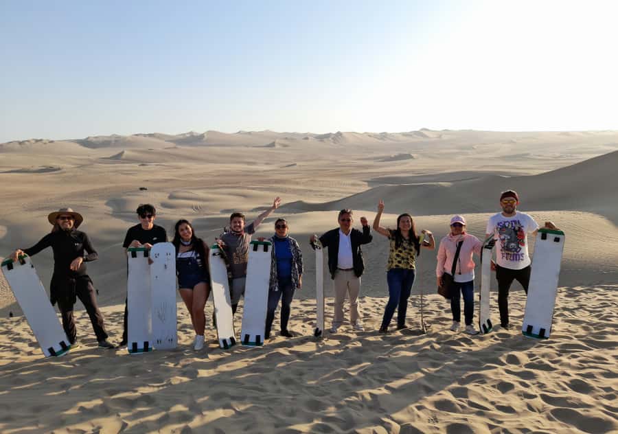 From Lima: Ballestas Islands, Huacachina with buggy Economic - Huacachina oasis: tubular ride, dune buggy chaos, and sandboarding down the big dunes