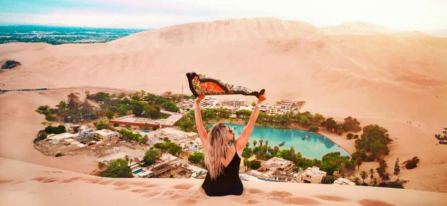 From Lima: Full Day to Paracas and Huacachina Desert Oasis - Huacachina dunes: 4WD dune buggy ride and sandboarding reality check