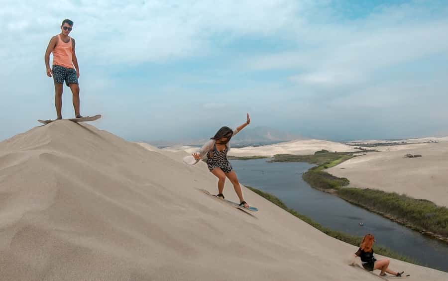 From Paracas: Mini Buggy Tour & Sandboarding at Oasis - The Oasis lagoon in the Pisco desert, why the change of pace matters