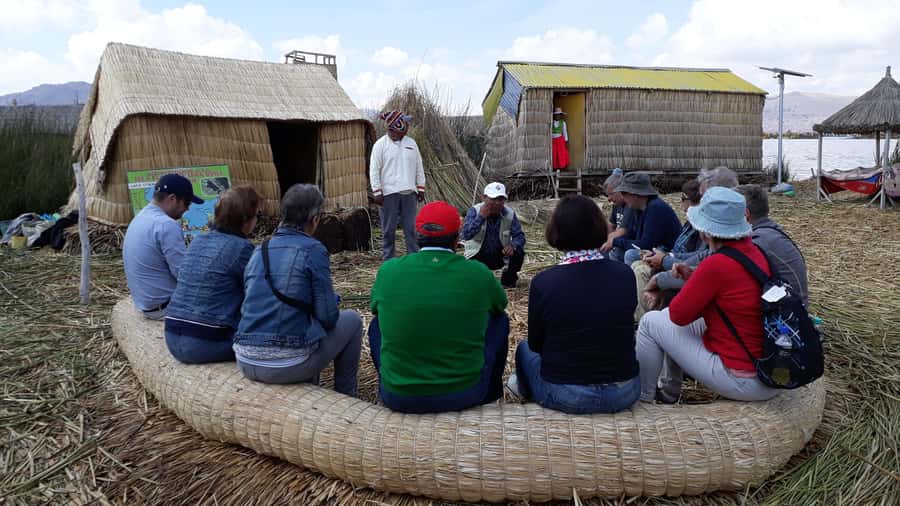 From Puno: full day tour to Uros and Taquile with Lunch - Taquile Island: uphill walk, shopping time, and a solid lunch