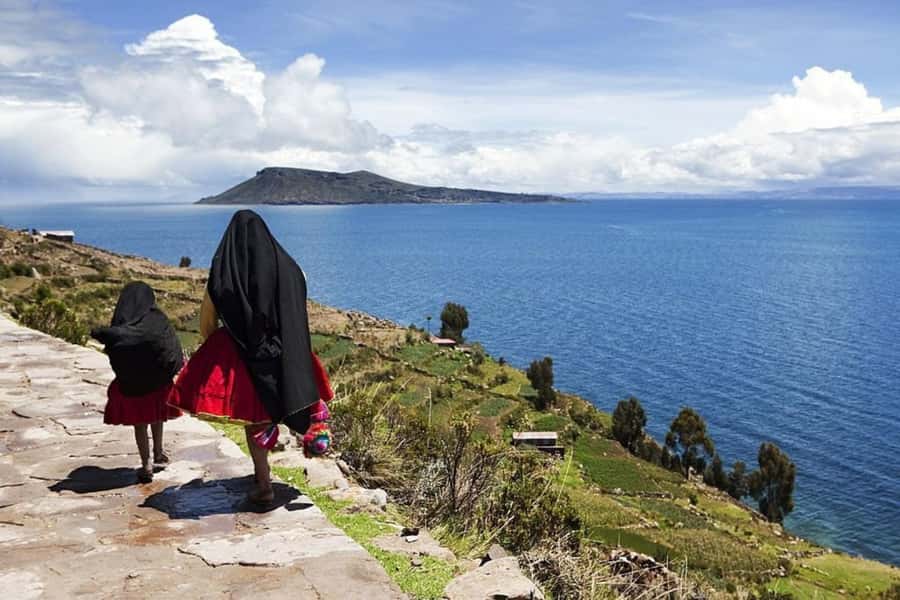 From Puno: Uros and Taquile Islands Full-Day Tour - The long middle stretch: boat and transfer time toward Taquile