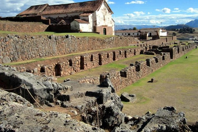 Full-Day Excursion to Sacred Valley, Pisac and Ollantaytambo from Cusco - Chinchero (Complejo Arqueologico Chinchero): Inca walls under colonial paint