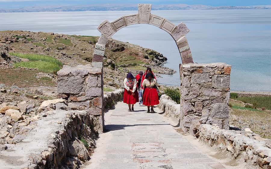 Full Day Tour to Titicaca Lake in Puno: Uros and Amantani - Amantani Island: the 1-hour walk up and the life you see in textiles