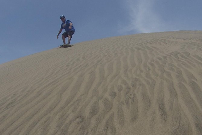 In Lima: Sandboarding Off Road Half Day!! - Getting to the dunes from Lima: 4x4 pickup, highway, and a bread stop