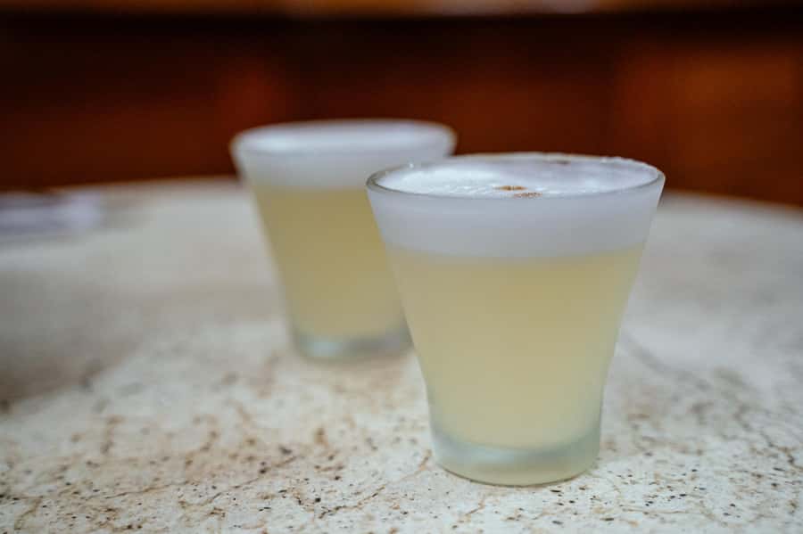 Lima: Flavors and Tradition Walking Tour with Food Tasting - San Francisco church, churros, and the classic Cordano Tavern finish