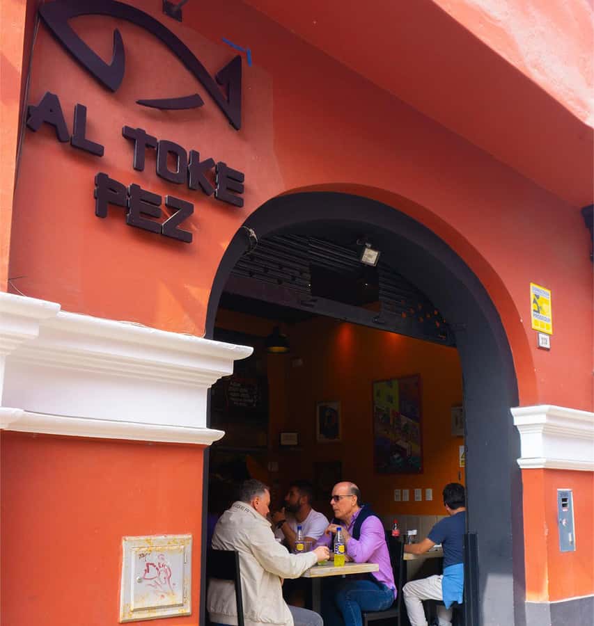 Lima: Street Food Tasting Tour with Pisco Sour Class - Kicking off in Chorrillos, where the sea sets the flavor mood