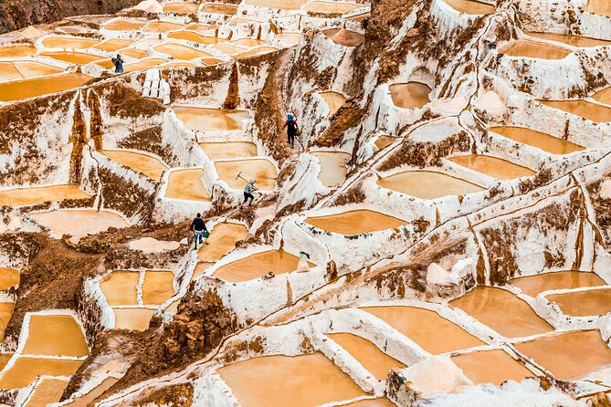 Moray and Maras Salt Mines Full Day Tour - Small Groups - Maras town: colonial stone doors with Andean traditions