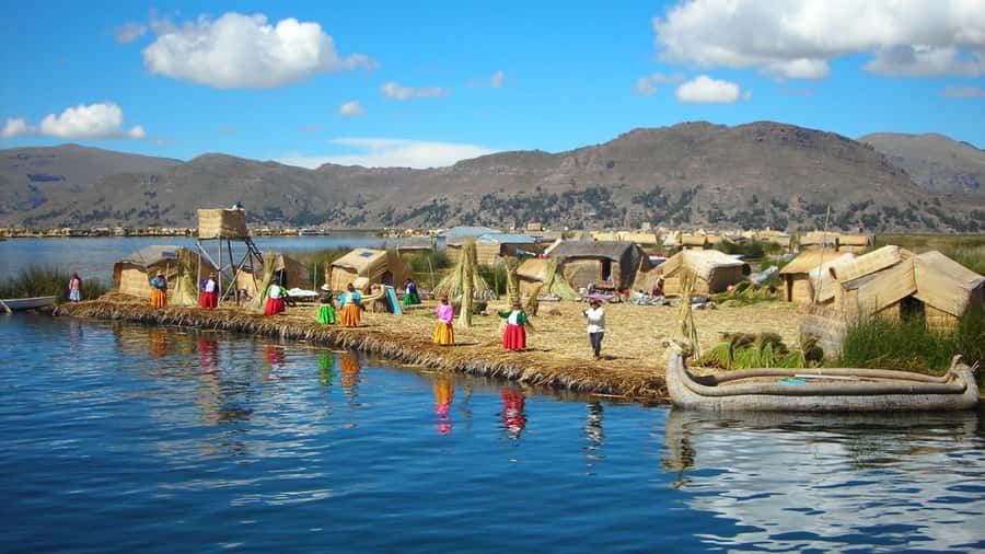 Puno: Lake Titicaca, Uros, and Taquile Full-Day Tour - Uros Floating Islands: Sugarcane Homes and the Water Tribe